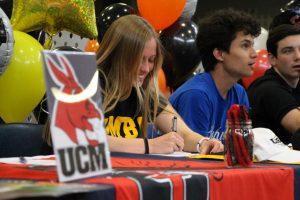 Senior Morgan McGruder signs to University Maryland, Baltimore County for soccer.