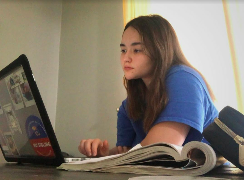 Junior Grace Whittinghill doing online classes. According to Whittinghill, even though it is different, online school has its benefits. “It’s a lot different than actually learning at school, but having online school helped me kind of structure my days more,” Whittinghill said.