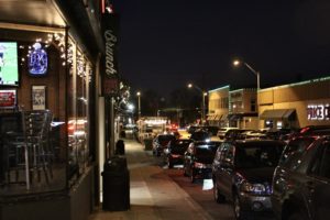 Streets outside of the Brookside Shops lined with cars as the frenzy of the holiday season begins.