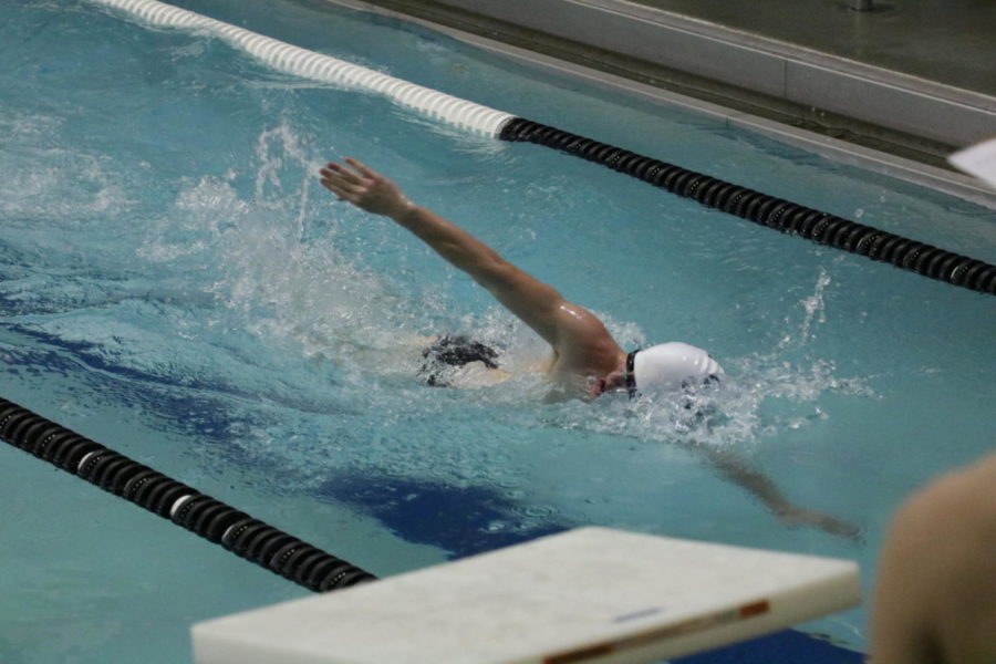 Boys swimmers prepare for their state meet.